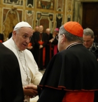 Pope Francis greets Cardinal Burke
